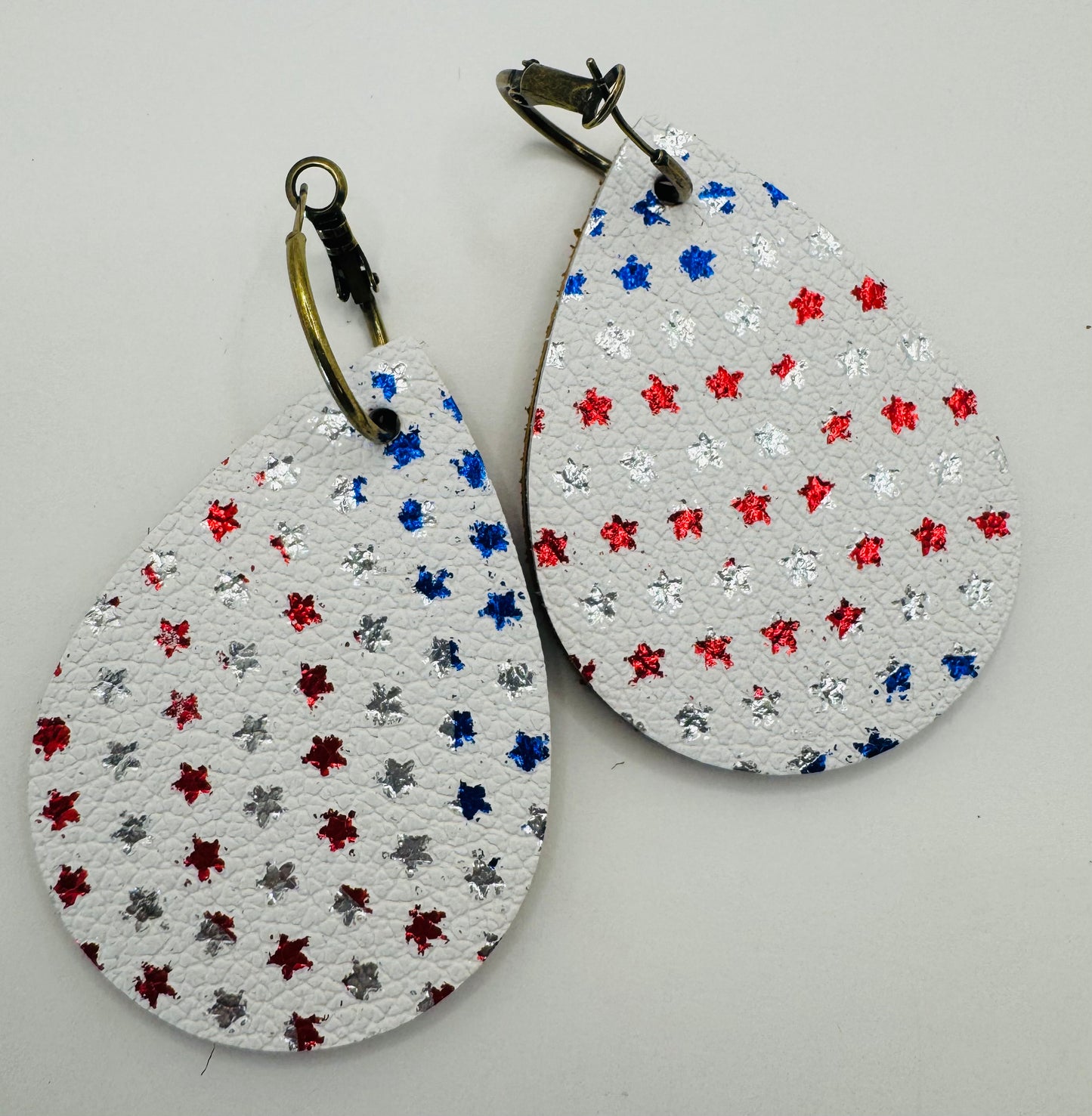 Red & Blue Metallic Star Earrings by Jagged Leather