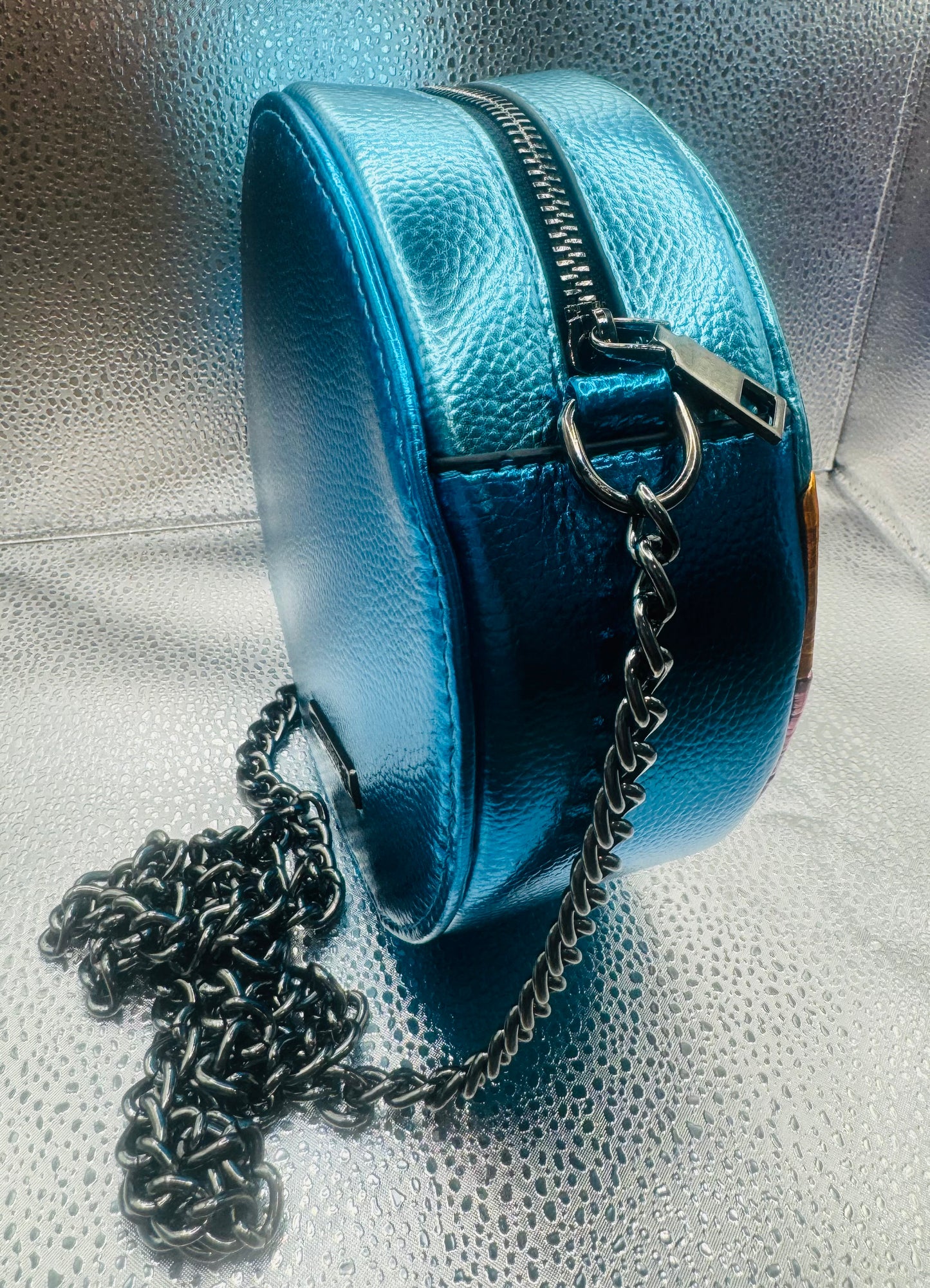 Metallic Prism Glow Round bag