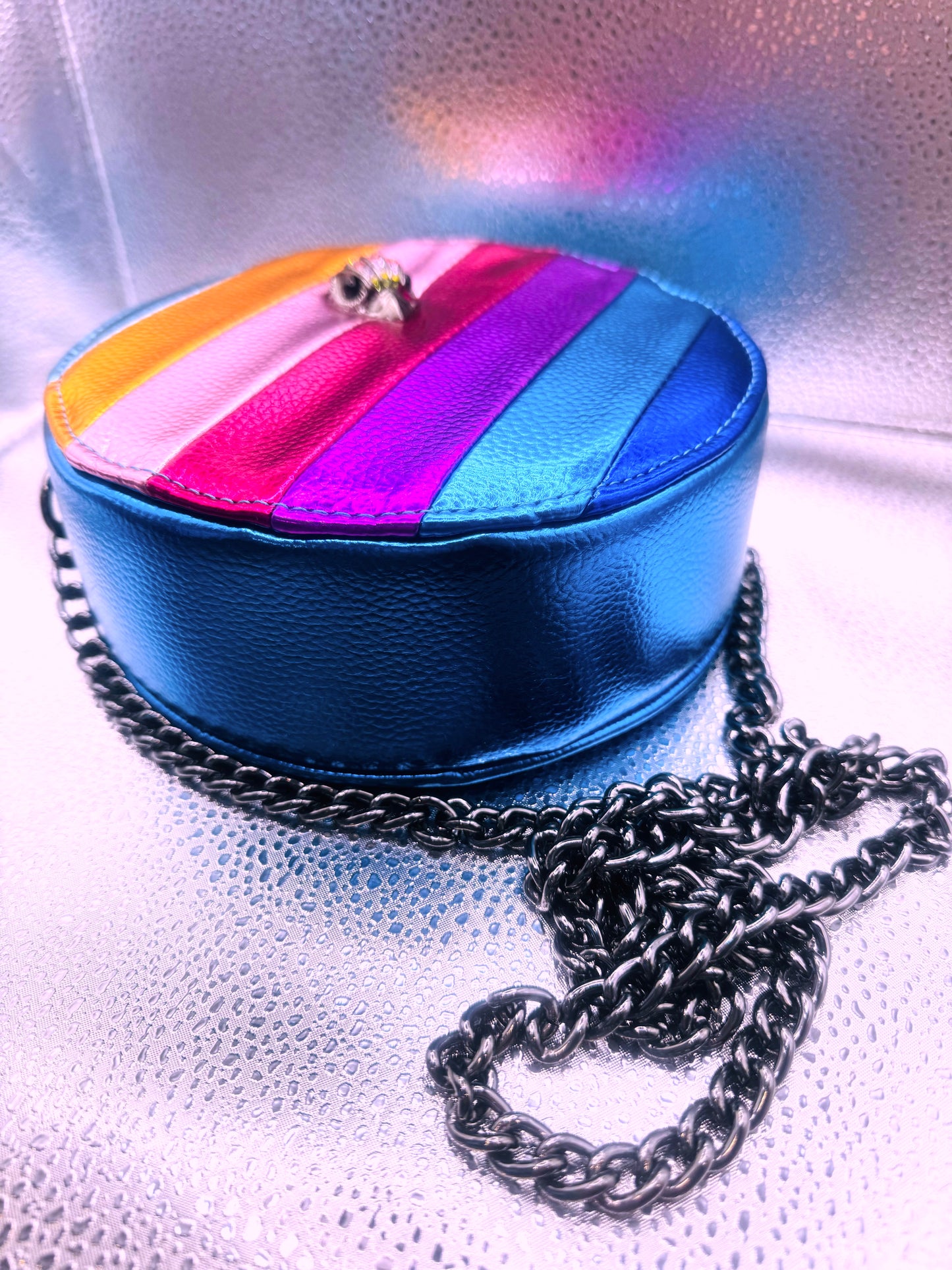 Metallic Prism Glow Round bag