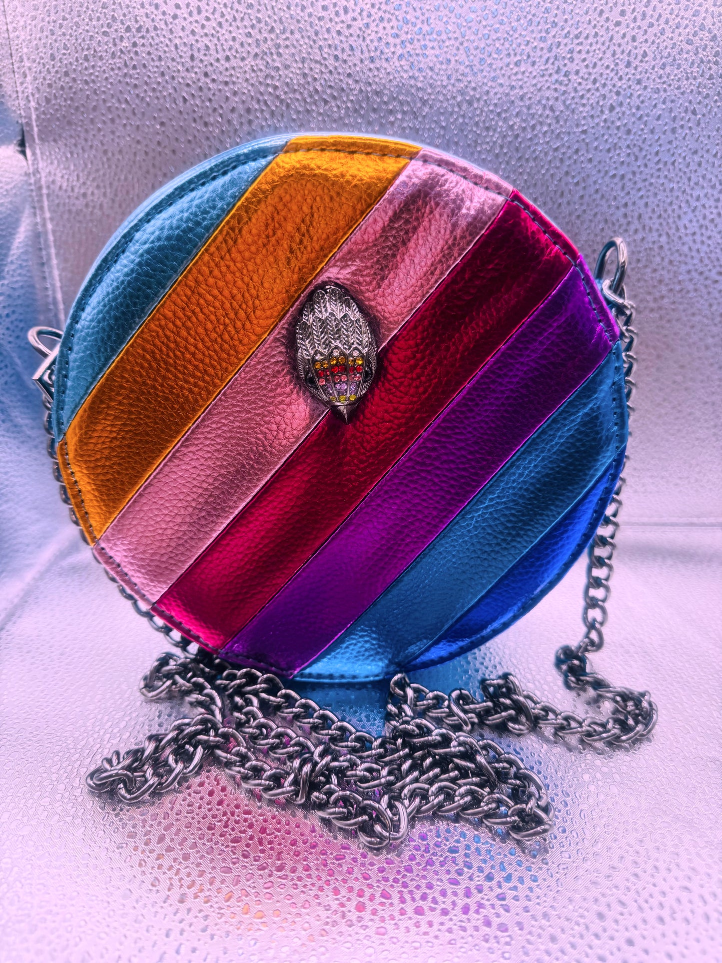 Metallic Prism Glow Round bag